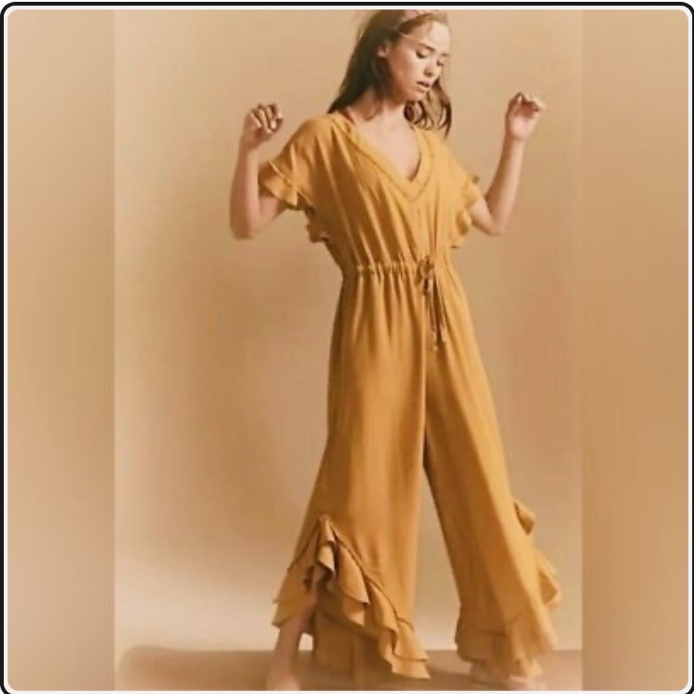 FP Movement by Free People Mustard Jumpsuit, size XS. New with out tag.